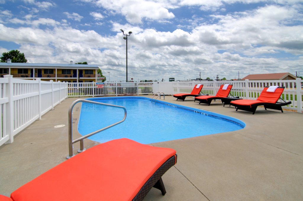 Seasonal outdoor pool at Westbridge Inn & Suites